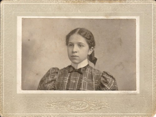 A mystery person (probably a relative) in a photograph taken at a studio at 7th and Vine St. in Cincinnati
