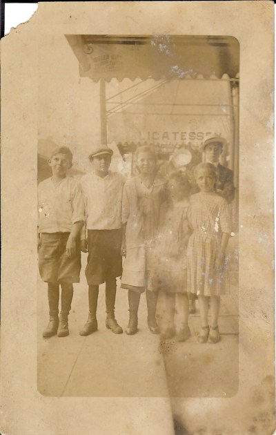 Likely Cincinnati (check out the "Queen City" label on the inside of the overhang).  I think the second kid from the left is probably my great grandpa, but I'm not 100%.  